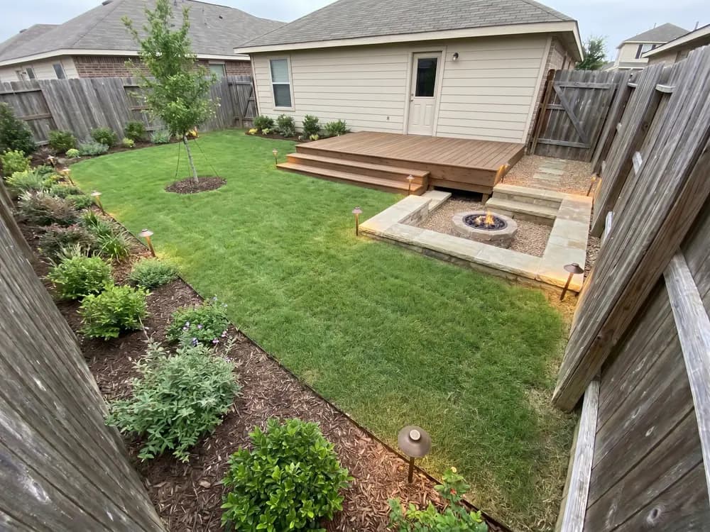 A backyard landscape design generated by OutdoorBrite from the owner's photo