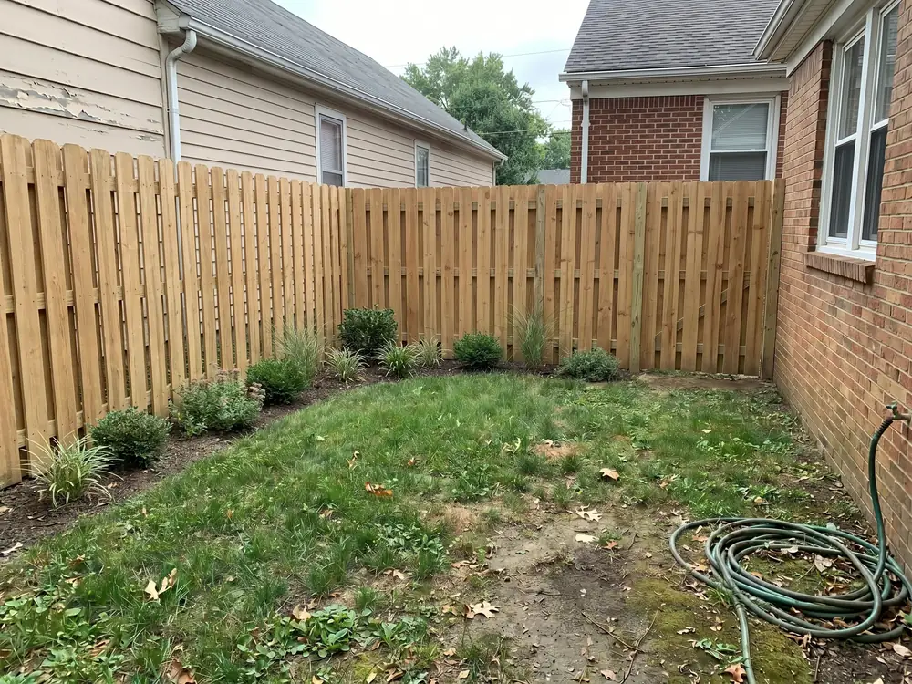 A backyard landscape design generated by OutdoorBrite from the owner's photo