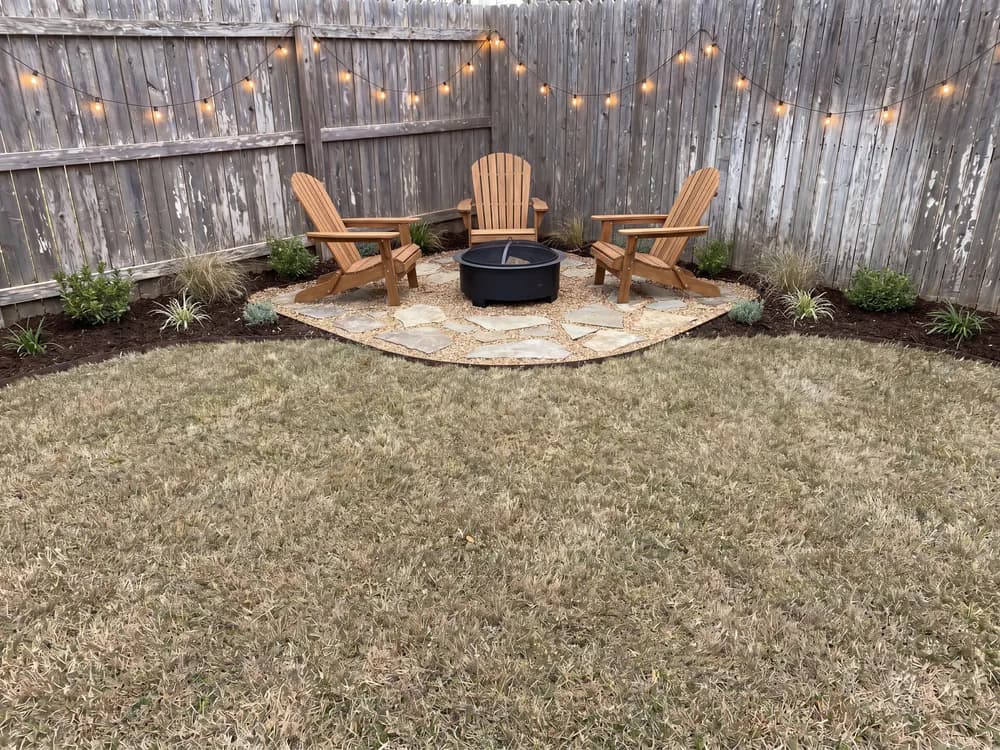 A backyard landscape design generated by OutdoorBrite from the owner's photo