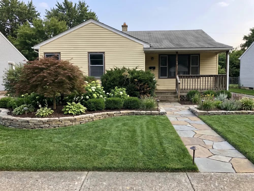 A backyard landscape design generated by OutdoorBrite from the owner's photo