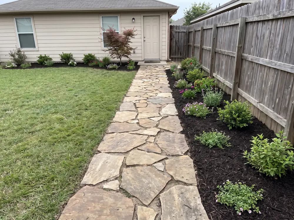 A backyard landscape design generated by OutdoorBrite from the owner's photo