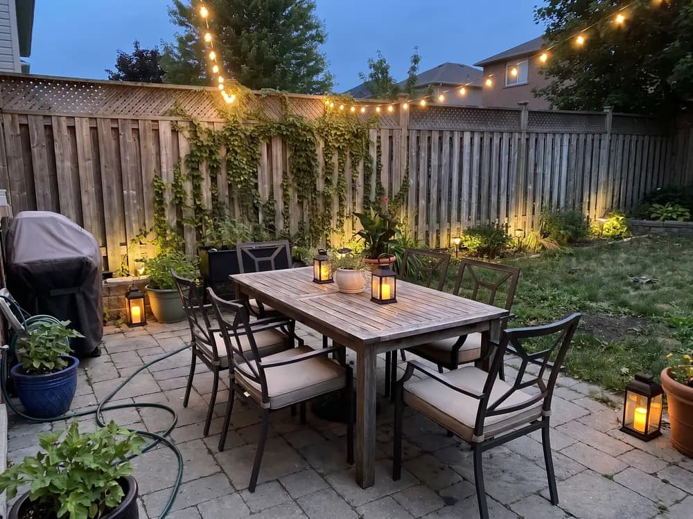 A backyard landscape design generated by OutdoorBrite from the owner's photo