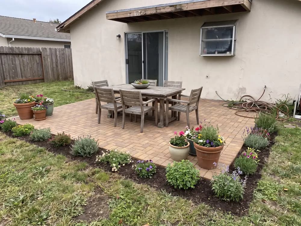 A backyard landscape design generated by OutdoorBrite from the owner's photo