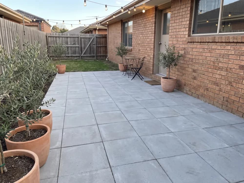 A backyard landscape design generated by OutdoorBrite from the owner's photo