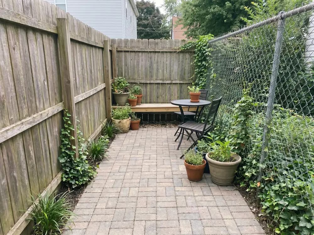 A backyard landscape design generated by OutdoorBrite from the owner's photo