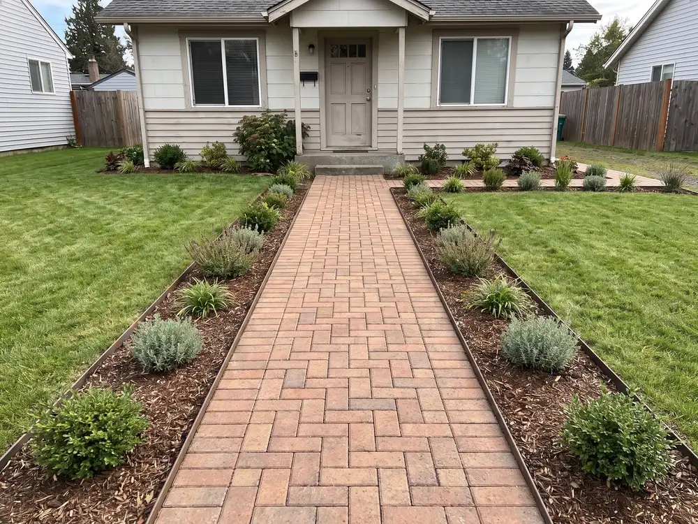 A backyard landscape design generated by OutdoorBrite from the owner's photo