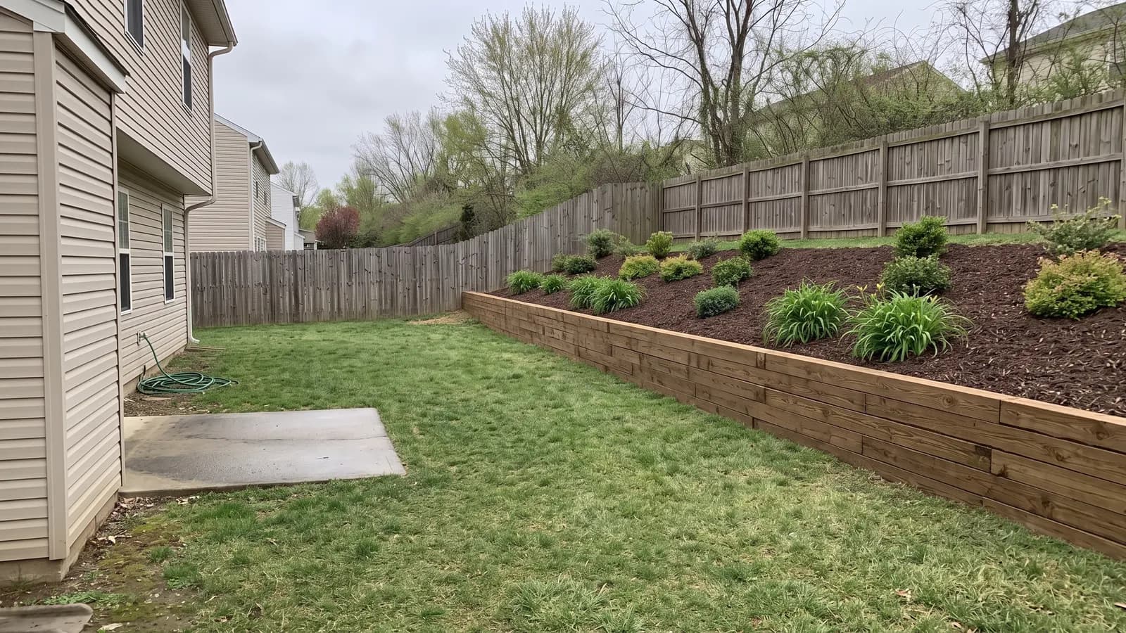 AI concept of a wooden retaining wall made of stacked brown landscape timbers on the same slope, with a mulched bed of daylilies above
